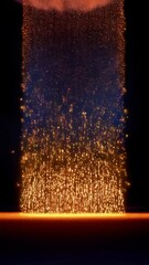Wall Mural - cascading sparks and embers falling onto glowing surface, a stream of warm, golden light, abstract b
