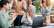 © peopleimages.com - Applause, success and business people with team for winning, bonus or creative proposal approval. Excited, group and laptop with happiness, cheers and celebrate for collaboration funding at startup