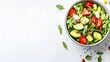© Laily - Fresh Green Salad with Cucumber, Tomato, and Seeds in Bowl
