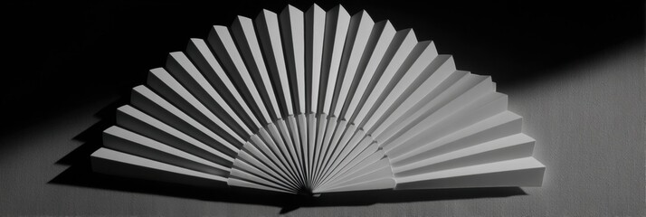 Leinwandbilder - Intricate Shadows Create Delicate Patterns From a Simple Paper Fan in a Softly Lit Room Generative AI