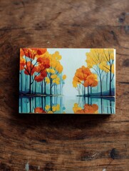 Poster - Vibrant Autumn Postcard Showcasing Colorful Trees and Serene Water Reflections on a Rustic Wood Surface Generative AI