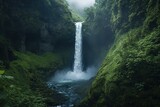 A scenic waterfall cascading down a cliff surrounded by lush green vegetation and a flowing stream below
