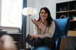 © Andrii Zastrozhnov - Caucasian young female therapist engaging with patient in modern office setting