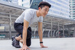 © Quality Stock Arts - Sport Healthy Asian young man ready for go running at city outdoor office building background