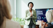 © EinFrame25/peopleimages.com - Applause, presentation and woman with smile, achievement and training for machine learning or happy. Celebration, colleagues and people with successful meeting, clapping or excited for ai in business