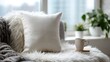 © Suphawan - Blank pillow on a cozy, plush sofa, ideal for showcasing a home decor design or relaxing mood