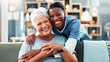 © peopleimages.com - Senior, happy women or portrait with nurse hug for healthcare, assisted living or volunteer service. Female people, caregiver or smile with love, elderly care or retirement wellness at old age home