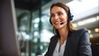© sogap - Professional Woman Providing Customer Support Online Using a Headset While Working in the Office to Help Her Customers All the Time