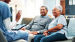 © FrameFlex/peopleimages.com - Nurse, tablet and healthcare with senior couple, home and support with medical professional. Discussion, insurance or life cover with mature man, woman and meeting for consultation and communication