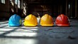 © zalfa_std98 - Colorful safety helmets on a dusty factory floor