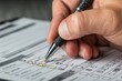 © PhotoProd - Close up of completing questionnaire with pen filling boxes of answer options, form with checkboxes filled