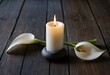© AdityaGM - Peaceful candlelight scene with white Calla lily on rustic wood. Generative Ai
