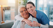 © peopleimages.com - Elderly, woman and nurse with portrait on sofa for healthcare support, compassion and bonding in retirement home. Senior person, caregiver and happy for homecare assistance, medical help and embrace