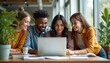 © Maryna - Diverse group young creative professionals working together at office. Team members watch laptop screen, smile. Project discussion, collaboration, coworking space. Happy, smiling people. Modern