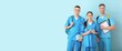 © Pixel-Shot - Group of medical students on light blue background with space for text
