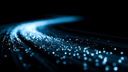 Fototapete - A blue light trail with glowing particles on black background, representing fast digital data transfer in the internet and network connection technology concept, futuristic speed of information