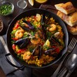 © Sky Layer - spanish paella with seafood and saffron