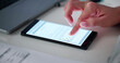 © Andrey Popov - Businesswoman Signing Digital Contract On Smartphone