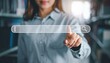 © M - Young woman searching online in a modern library environment, focusing on digital information and technology accessibility
