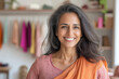 © Shivani - a indian business woman smiling at the camera who owns a boutique