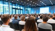 © Natawut - Audience Attentively Engaged in a Conference Presentation Event