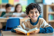 © Shivani - cute little boy reading book in the classroom