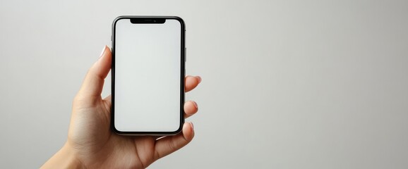Hand holding a modern smartphone