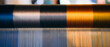 © NewSaetiew - Silk thread from weaving machine traditional craft, a vibrant tapestry of color.
