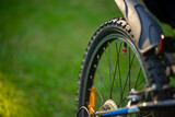 The rear wheel of a bicycle with a tire.Bicycle repair shop.Tire replacement on the road.