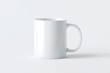 © AuraArt - Blank white mug on a white background. Perfect for design mockups.