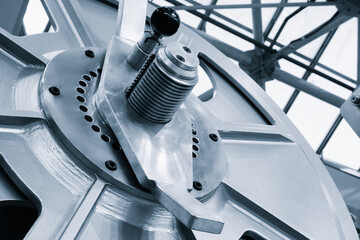 Poster - Close up of metal wheel as part of big industrial machine, industrial concept background