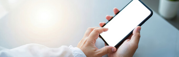 Poster - Hands holding smartphone device with blank white screen. Person using mobile phone for communication or business. Mockup design for presentation of app. Digital tech concept.
