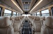 © Anggoro - Bus Interior with Rows of Seats and Modern Design