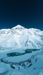Naklejka na meble snow covered mountain with a lake in the middle