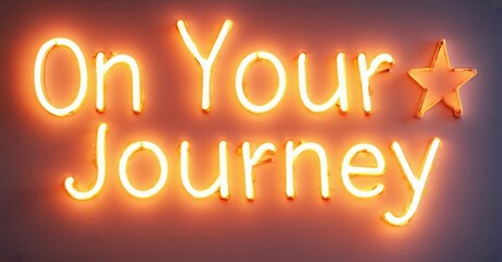 Fototapete - Bright neon sign displays inspirational message. Orange glow illuminates text against dark background. Simple, positive sentiment.