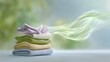 © Анастасия Мулюкова - Freshly folded laundry emits gentle freshness in a serene setting with soft colors and light