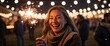 © Arceli - Joyful adult woman holding a sparkler on a festival night background