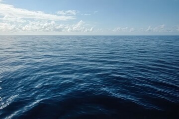 Aufkleber - Vast Blue Ocean Water Under Clear Sky with Light White Clouds at Daytime Serene Seascape with Open Horizon and Tranquil Tropical Waters in Daylight