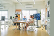 © whyframeshot - Corporate team meeting to evaluate digital marketing results, review growth data, and plan strategic business development for project success project strategy, performance data business growth office