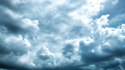 Poster - A dramatic sky filled with voluminous, dark gray cumulus clouds, illuminated by patches of bright sunlight creating a moody atmosphere. : Generative AI