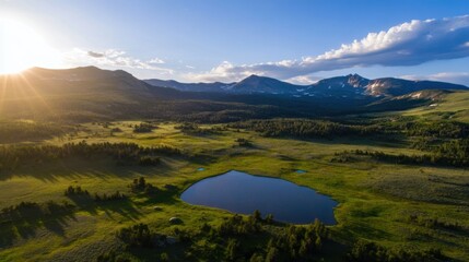 Leinwandbilder - Sunset illuminates a serene mountain valley landscape, featuring a tranquil lake nestled amidst lush green meadows and towering peaks under a partly cloudy sky. : Generative AI