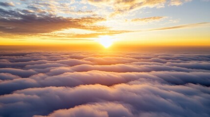 Aufkleber - Aerial view of a breathtaking sunset over a sea of clouds, showcasing vibrant orange and yellow hues in the sky, with soft purple-tinged clouds below. : Generative AI