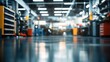© 娜 赵 - Spacious car repair workshop with shiny floors, tool cabinets, equipment, distant cars, and ceiling lights.