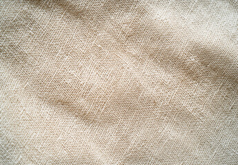 Aufkleber - Close-up view of a beige, textured fabric with a subtle weave pattern, ideal for textile design or background use.  The image showcases the natural, slightly rough surface of the mater : Generative AI
