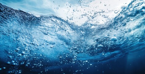 Poster - Underwater scene showing a wave breaking the surface with numerous air bubbles rising towards the sunlight, creating a dynamic and vibrant underwater image. : Generative AI