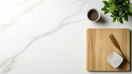 Poster - Overhead view of a minimalist kitchen scene featuring a wooden cutting board, a small bowl of spices, and a potted herb plant on a white marble countertop. : Generative AI