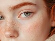 © Riya - Close up of freckled redheaded woman