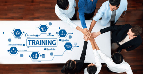 Poster - A dynamic training session featuring diverse professionals collaborating over an educational table, symbolizing teamwork, skill enhancement, and knowledge sharing in a modern setting. Amity