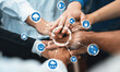 © InfiniteFlow - Group of diverse office worker join hand together in office room symbolize business synergy and strong productive teamwork in workplace. Cooperation and unity between business employee. Prudent Amity