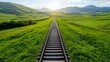 © Arif - Railroad Tracks in a Green Field Landscape